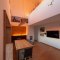 Main living area. Heating here is provided by ECOFILM F heating foils under a floating floor, supplemented in the winter months by a wood-burning fireplace