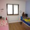 V dětském pokoji je kromě podlahové topné folie ECOFILM i sálavý panel ECOSUN E